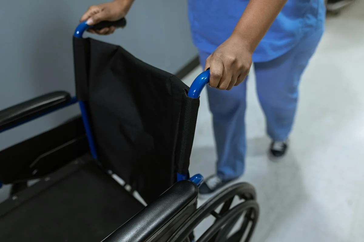 Disability support worker providing quality care in SIL environment