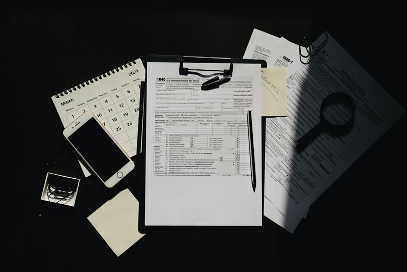 Tax documents and calendar showing deadline preparation urgency